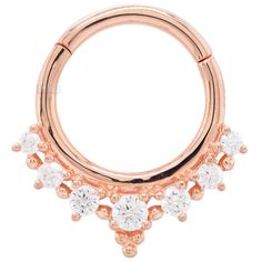 16 ga. 14kt Yellow, White or Rose Gold Description & Features: The "Lala" hinged ring is a perfect example of how there's nothing better than an inspired combination of gems and beadwork. (1) 2mm Round White CZ surrounded by (2) 1.75mm Round White CZ's, (2) 1.5mm Round White CZ's & (2) 1.25mm Round White CZ's in Prong's Available in 5/16" and 3/8" diameter ★★★★★★★★★★★★★★★★★★★★★★ Brand: Buddha Jewelry Organics Collection: 40709 Material(s): solid 14kt gold, cz's Item Code: Commonly worn in: daith Elegant Hoop Septum Ring With Prong Setting, Elegant Cubic Zirconia Septum Ring With Diamond Accents, Elegant Diamond Septum Ring, Elegant Diamond Septum Ring For Wedding, Elegant Round Diamond Septum Ring, Elegant Rose Gold Septum Ring For Wedding, Elegant Wedding Septum Ring, Elegant Septum Ring With Prong Setting In Cubic Zirconia, Elegant Cubic Zirconia Septum Ring With Prong Setting