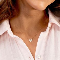 An array of dazzling diamonds illuminates this 14k gold heart necklace and elevates a timeless silhouette. Product Details 0.358 total carat weight Fifty-four .9mm and four 1mm GH SI1 white diamonds 14k gold 15" chain + 2" extender. Adjustable in 1" increments 15" - 17" Heart measures 3/8" Spring ring closure Avoid contact with anything containing derivatives of alcohol | Diamond Pave Heart Necklace in Gold, Women's in 14k gold by Fine Diamond Heart Charm Jewelry With Heart Cut, Diamond Jewelry With Heart Charm, 14k Gold Heart Pendant Diamond Necklace For Anniversary, Elegant Diamond Heart Charm Jewelry, Diamond Heart Charm Jewelry, Delicate Diamond Heart Pendant Jewelry, Wedding Heart Pendant Necklace In Fine Jewelry Style, Fine Jewelry Heart Pendant Necklace For Wedding, Heart-shaped Yellow Gold Diamond Necklace