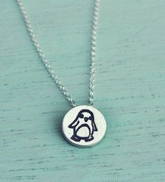 Penguin necklace -- tiny silver penguin jewelry -- trending now jewelry -- best sellers -- cute anim Cute Nickel-free Round Necklaces, Playful Silver Charm Necklaces, Cute Pendant Charm Necklace For Gift, Cute Silver Round Charm Necklace, Gift Tiny Round Pendant Charm Necklaces, Cute Silver Round Charm Necklaces, Tiny Round Pendant Charm Necklaces As Gift, Tiny Round Pendant Charm Necklaces For Gift, Handmade Cute Charm Necklaces