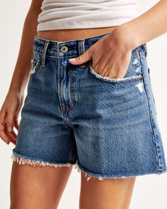 Elevate your casual wardrobe with the Abercrombie & Fitch Women's Low Rise Baggy Shorts. Perfect for those laid-back days, these shorts offer a unique blend of comfort and style.

- Size: 36
- Color: Medium Indigo Wash
- Material: Body - Cotton, Lyocell; Pocket Bag - Mixed Materials
- Gender: Female
- Features: Low rise, baggy and relaxed fit through the leg, fitted at the waist, 4-inch inseam, lightweight rigid denim, distressed details, frayed hem

These shorts are designed to provide a relaxe High Rise Distressed Bottoms For Everyday, Everyday High Rise Distressed Bottoms, Distressed Mid-rise Bottoms For Everyday, Everyday Distressed Mid-rise Bottoms, Mid-rise Distressed Bottoms For Everyday, Everyday Mid-rise Distressed Bottoms, Mid-rise Medium Wash Jean Shorts With Hip Pockets, Mid-rise Jean Shorts With Hip Pockets In Medium Wash, Frayed Hem Bottoms For Fall