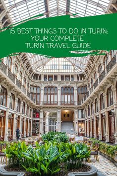 the inside of a building with plants in it and text overlay that reads 15 best things to do in turn your complete travel guide