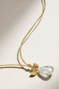 Pippa Small's necklace is adorned with a dainty aquamarine charm inspired by a peacock feather - the symbol is believed to represent protection, balance and renewal. It's hand-cast from 18-karat gold and strung on a braided cord that's ideal for layering. Gold Blue Topaz Teardrop Pendant, Luxury Teardrop Blue Topaz Jewelry, Elegant Blue Topaz Teardrop Pendant Necklace, Elegant Blue Topaz Teardrop Necklace, Yellow Gold Teardrop Blue Topaz Necklace, Yellow Gold Blue Topaz Necklace, Chrysoprase Necklace, Small Necklace, Peridot Necklace