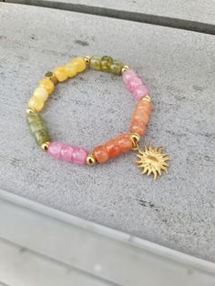 Wizard Of Oz Bracelet, Sunset Beaded Bracelet, Pony Bead Ideas Bracelets, Pony Bead Bracelets Aesthetic, Casual Gold Beaded Charm Bracelet, Gold Beaded Bracelets For Vacation, Trendy Round Bead Jewelry For Vacation, Gold Bohemian Crystal Bracelet With 8mm Beads, Colorful Beaded Jewelry For Vacation