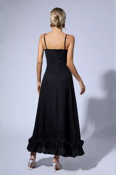 Get ready to turn heads in the stunning Izabella Black A-line Maxi Dress! Crafted from premium, comfortable fabric, this dress is designed to accentuate your curves and hug your body in all the right places. The A-line skirt adds elegance, and the strappy dress adds just the right amount of flirtatiousness. In classic understated black, all you need is pumps and statement earrings for a chic look.  Dress Length: Approx 130cm Materials: Viscose Fiber Gentle Dry Clean Only  Model is 5 ft 7 and wea A-line Ruched Maxi Dress For Evening, Black Fitted A-line Maxi Dress, Fitted Black A-line Maxi Dress, Fitted A-line Slip Dress For Cocktail, Elegant Midi Dress With Ruffle Hem And Sweetheart Neckline, Ruched A-line Fit And Flare Dress, Fitted A-line Maxi Dress For Parties, Party A-line Maxi Dress With Ruffle Hem, Solid Evening Dress With Ruffle Hem