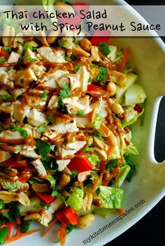 a white bowl filled with chicken and veggies