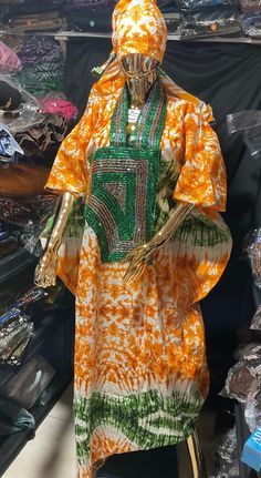 Kampala/Adire  Bubu, Ankara Bubu, African Kaftan, African Kaftan for Women, African print dress, Boubou Dress, Tye & Dye Bubu -  Handmade - Aso-Oke - Orange color  Senegalese boubou Kampala/Adire Long African women Bubu  Dress✨ One size  100% natural hand dyed  fabric: blend of cotton and polyester  Care instructions: Hand wash in cold water- do not BLEACH  no return no exchange no refund  Kindly allow a difference of the picture/pattern of your item(s) between the real-life image and the photog Green Kaftan With Traditional Patterns, Green Batik Print Dress For Festival, Green Festival Dress With Batik Print, Traditional Green Batik Print Kaftan, Green Batik Print Kaftan, Traditional Multicolor Ankara Kaftan, Traditional Multicolor Ankara Fabric Kaftan, Traditional Green Kaftan With Batik Print, Multicolor Bohemian Kaftan In Ankara Fabric