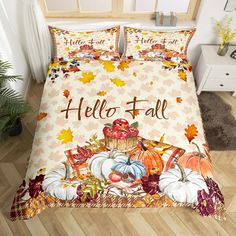 an image of a bed set with hello fall on the comforter and pillow cases