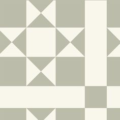 a white and gray wallpaper with triangles on it