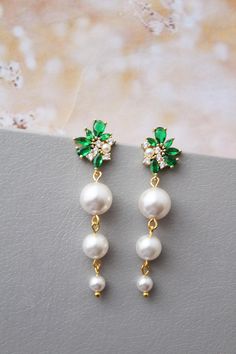 Green Drop Pearl Earrings For Wedding, Green Pearl Earrings For Wedding, Green Dangle Pearl Earrings For Anniversary, Green Dangle Chandelier Earrings For Weddings, Green Pearl Drop Jewelry For Wedding, Green Pearl Drop Wedding Jewelry, Elegant Green Chandelier Earrings For Wedding, Elegant Green Pearl Drop Bridal Earrings, Green Chandelier Drop Earrings For Wedding