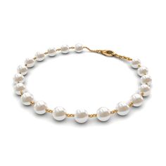 Product Details The Station Chain Bracelet in gold is a beautiful and elegant piece of jewelry that is perfect for any occasion. Adorned with lustrous round freshwater pearls, this bracelet offers a timeless and sophisticated look that will complement any outfit. The pearl bracelet is crafted in high-quality gold metal and features a secure lobster clasp closure to ensure that it stays in place all day long. Perfect for layering with other bracelet or wearing alone, this pearl station chain bracelet is a versatile addition to any jewelry collection. It also makes for a thoughtful gift for a loved one or a special treat for yourself. Product Information SKU SHP-BRACELET022210427 Weight 1.36 gm (Approximate) FRESHWATER PEARL INFORMATION No.of Stones 11 Pieces Total Weight 82.28 Carat (Approx Pearl White Round Bracelets With Pearl Chain, White Pearl Chain Round Bracelets, Gold Round Pearl Drop Bracelet, Pearl White Round Pearl Drop Bracelet, Classic Gold-plated Pearl Chain Bracelet, Yellow Gold Bracelet, The Pearl, Pearl Bracelet, Chain Bracelet