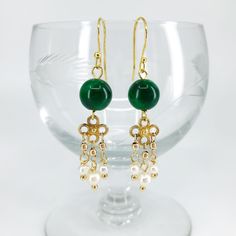 "Just as every luminous pearl begins as a grain of sand, we begin as flawed beings and improve ourselves daily. These \"Seeds of Heaven\" earrings are both glamorous and understated, perfect to accompany you wherever your personal journey leads. ⚜Item Specifics ❀ Gold Plated Sterling Silver Ear Wire ❀ Gold Plated Sterling Silver Clover Flower ❀ Natural Jade (8mm) ❀ Fresh Water Pearl (6mm) ❀ Total length is approximately 1.75 inches ⚜No Risk Guarantee ❀ If you are unhappy with your jewelry, you w Jade Beaded Dangle Earrings For Gift, Elegant Latkan Earrings With Round Beads, Elegant Latkans Earrings, Jade Pearl Drop Earrings As Gift, Elegant Jade Beaded Round Earrings, Elegant Jade Beaded Earrings With Round Beads, Jade Earrings With Dangling Beads As A Gift, Elegant Green Chandelier Earrings With Latkans, Elegant Green Chandelier Earrings With Round Beads