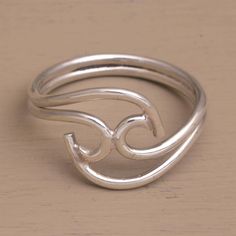 Curvaceous waves seem to collide in this unique ring design from Made Sri in Bali. The ring is crafted of sterling silver with a brilliant polished finish. Pearl Stacking Ring, Unique Ring Designs, Silver Cocktail, Silver Elephants, Jewelry Workshop, Sterling Silver Rings Bands, Unique Ring, Silver Band Ring, Small Jewelry