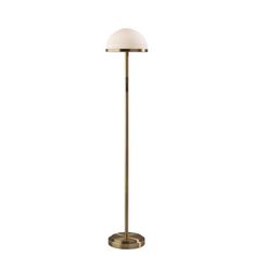 a brass floor lamp with a white shade on the top and an oval light in the middle