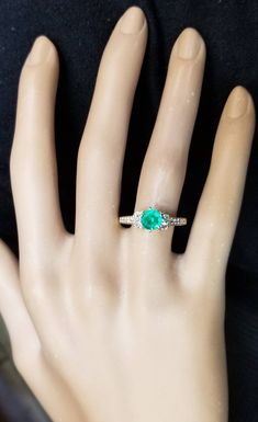 Gorgeous 18k Yellow gold ring natural green Emerald, Center round shape weight 0.92ct. size 5.9m very nice rich medium green color nice luster lively,brilliant stone and clean. side diamonds total weight 0.50ct. SI1-G ring size 7.5 Resizable Retail value $6,500 net . Appraisal available Green Diamond Ring Fine Jewelry, Green Diamond Cluster Ring, Green Diamond Ring With Brilliant Cut, Green Diamond Ring With Brilliant Round Cut, Classic Green Round Cut Diamond Ring, Green Diamond Birthstone Ring, Classic Green Diamond Round Ring, Emerald Ring With Brilliant Cut, Classic Round Green Diamond Ring