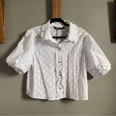 Semi Sheer Short Sleeve Button Up Shirt With Floral Texture, Ruffle Trimmed Collar, And Sparkly Buttons. New With Tags. Please Carefully Review Each Photo Before Purchase As They Are The Best Descriptors Of The Item. My Price Is Firm. No Trades. First Come, First Served. Thank You! :) Casual Blouse With Peter Pan Collar And Button Closure, Spring Tops With Button Cuffs And Peter Pan Collar, Spring Tops With Peter Pan Collar And Button Cuffs, Casual Tops With Peter Pan Collar And Button Closure, Chic Button-up Tops With Pearl Buttons, Chic Tops With Peter Pan Collar And Buttons, Chic Top With Peter Pan Collar And Buttons, Vintage Tops With Buttons For Day Out, Vintage Buttoned Top For Day Out