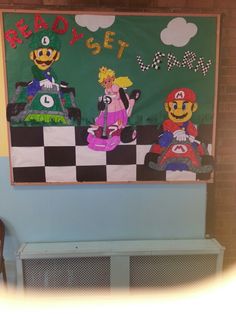 a bulletin board with mario kart and other cartoon characters hanging on it's wall