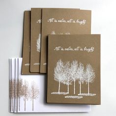 three cards with trees on them and the words all is calm, all is bright