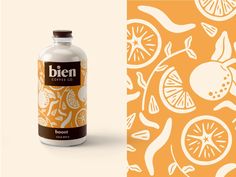 a bottle of vitamin water next to an orange and lemon print background with the word ben on it