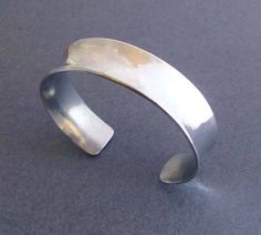 Streamlined Aluminum Cuff Bracelet Hammered Silver Tone Cuff Modern Minimalist 10th Anniversary Gift Modern Hand-cast Cuff Bracelet As Gift, Modern Hammered Cuff Bracelet As Gift, Aluminum Bracelets, 10th Anniversary Gifts, Small Drop Earrings, Aluminum Jewelry, Anniversary Gift For Wife, Anniversary Gifts For Wife, Modern Gift