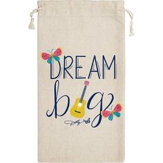 a bag with the words dream big written on it and a guitar in blue ink