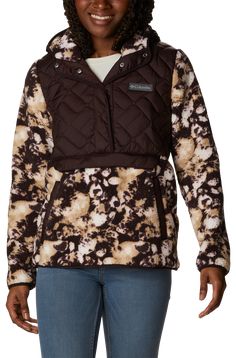 Stay warm on the trail with the Columbia Sweet View Hooded Fleece Long-Sleeve Pullover for Ladies. This women's pullover features a plush sherpa fleece for supersoft warmth, plus Omni-Shield advanced repellency overlay delivers a wind- and water-resistant performance to stand up to the elements. A reinforced kangaroo pocket warms your fingers, while the top-stitched quilting provides a great look. This Columbia hoodie has a snap placket for easy on and off, while a concealed zip-close pouch pock Long Sleeve Tops For Hiking In Fall, Long Sleeve Tops For Fall Hiking, Hooded Winter Hiking Tops, Hooded Winter Tops For Hiking, Hooded Top For Winter Hiking, Long Sleeve Fleece Top For Hiking, Winter Hiking Long Sleeve Top, Winter Long Sleeve Top For Hiking, Fleece-lined Tops For Winter Outdoor Activities