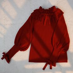 Size 			S 			M 			L 		 		 			Full Length 			56 			58 			60 		 		 			Bust 			80 			84 			88 		 		 			Waist 			70 			74 			78 		 		 			Neck Circumference 			18 			19 			20 		 		 			Sleeve Length 			58 			59 			60 Long Sleeve Sweater With Ruffles For Fall, Fitted Red Knit Top For Fall, Red Long Sleeve Knit Top For Spring, Red Long Sleeve Knit Top For Fall, Red Knitted Long Sleeve Tops, Burgundy Knitted Sweater For Fall, Fall Ruffled Knit Tops, Fall Knit Tops With Ruffles, Fall Knit Ruffle Tops