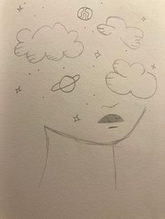 a drawing of a woman's face with clouds and planets above her head