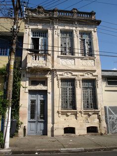 an old building with windows and balconies