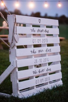 a wooden sign that says the first day on it