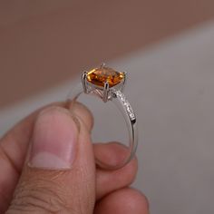 This is a gorgeous handmade creation. Its beauty is its simplicity & Elegance. The 8*8mm cushion shape citrine is crafted in solid sterling silver and with rhodium plated. All item is sent in a beautiful gift box You can realize more lovely stuff clicking the link https://www.etsy.com/shop/knightjewelry?refshopsection_shophome_leftnav Please leave the correct address and you phone number for delivering successfully. White Gold Citrine Birthstone Ring With Gemstone, Citrine Cushion Cut Jewelry For Anniversary, Fine Jewelry White Gold Citrine Topaz Ring, Luxury Silver Topaz Ring With Citrine, Wedding Amber Topaz Ring In Sterling Silver, Cushion Cut Citrine Rings As Gift, Citrine Cushion Cut Wedding Rings, Cushion Cut Citrine Wedding Rings, Citrine Cushion Cut Gemstone Rings