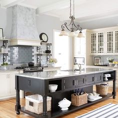 a large kitchen island with baskets on it