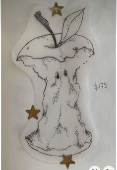 an apple with leaves and stars on it is shown in the shape of a drawing