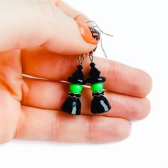 "How cute are these green witch earrings?! Made using genuine Swarovski pearls, beads and crystals. Everyone needs a pair of spooky Halloween earrings and these wicked witches are bound to please!  Measuring 23mm tall (3/4\") and finished with sterling silver ear wires. ✨Shipping✨   * We ship next business day via Royal Mail 1st Class within the U.K. and via Royal Mail International Standard for international orders.   * Shipping upgrades are also available at the checkout    ✨Buying as a Gift?✨ Witchy Earrings, Spooky Earrings, Oversized Hoop Earrings, Witch Earrings, Daisy Bracelet, Earrings Halloween, Wicked Witch, Jewellery Uk, Green Witch