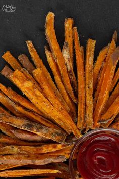 baked sweet potato fries with ketchup on the side