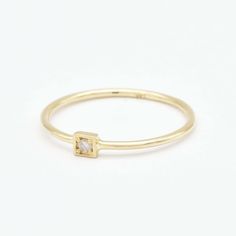 Square Diamond Gold Ring set with Natural Diamond, size 2 millimetres diameter, 0.03 Carats. Solid 14k Yellow Gold ☞ made to last.Click here for ☞ Solid Gold Collection﻿Diamond Details:• CERTIFIED Natural Diamond • Weight: 0.03 Carats• Dimensions: 2 millimeter• Color: K• Clarity: I2• Cut: Round• Fluorescence: YesSetting Details:• 0.94 grams of 14k Solid Yellow Gold• Dimensions: Band width ≈ 1mm, thickness ≈ 1mm• Non-Tarnish - Perfect for everyday use - Lasts a lifetime*Final weight & dimensions 14k Gold Midi Rings With Single Diamond As Gift, Minimalist Rose Gold Diamond Ring With Birthstone, 14k Gold Midi Ring With Single Diamond, Minimalist Recycled Gold Diamond Ring For Anniversary, Minimalist Yellow Gold Diamond Ring With Birthstone, Minimalist Gold Birthstone Ring With Diamond Cut, Classic 14k Gold Filled Diamond-cut Jewelry, Minimalist 14k Gold Birthstone Ring With Diamond Cut, Minimalist 14k Stamped White Gold Diamond Ring