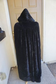 "Vintage hooded cape. I'm not sure of the are maybe 1930 or 40s? Condition - shows wear - has stains on lining - small hole - see photos. Measurements taken across front laid flat 16\" across shoulders 49\" length" Hooded Cape For Winter Costume Party, Hooded Winter Cape For Costume Events, Hooded Winter Cape For Costumes, Vintage Cape For Fall Costume, Vintage Winter Costume Cape, Vintage Cape-style Costume Outerwear, Vintage Cape Costume Outerwear, Vintage Cape For Costume Outerwear, Vintage Cape For Costume