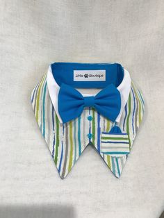 a collared shirt with a bow tie on it