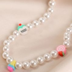 Korean Trendy Simulated Pearl Choker Necklace – Gofaer Finds store! White Beaded Pearl Charm Necklaces, Cute White Jewelry With Beaded Chain, Cute White Necklace With Round Beads, Cute White Necklaces With Round Beads, Sweet Handmade White Necklaces, Handmade White Sweet Necklace, Sweet Handmade White Necklace, Cute White Beaded Chain Necklace, Sweet Multicolor Party Jewelry