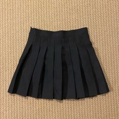 Black Pleated Mini Skirt Never Worn Size Medium In Perfect Condition Cheap Gray Mini Skirt For Summer, Black High Waist Lined Tennis Skirt, Black Tennis Skirt For Spring, High Waist Black Pleated Skort, Black Pleated Mini Tennis Skirt, Black Mini Tennis Skirt With Lining, Black High Waist School Skirt, High Waist Black Skirt For School, Black Mini Skort With Pleated Details