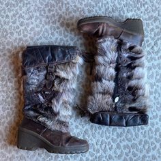 These Are The Coolest Boots From Nis- New Italia Shoes. They Feature A Heavy Rubber Sole, Leather Uppers, Fur Shafts Of The Boots, And Are Lined With Shearling. They Have A Top Leather Portion That Folds Down And Buckles And A Side Zipper. No Size Tag But They Fit Like A Us 7.5. These Are High-End Luxury Fur Boots That Will Look Amazing For Your Ski Vacation Or Everyday Wear In Winter. They Are In Good Condition But Do Have One Small Bare Spot In The Fur As Shown In The Last Photo. They’re Both Sheepskin Boots With Faux Fur Trim And Round Toe, Brown Sheepskin Boots With Leather Sole, Brown Shearling Boots With Leather Sole, Faux Fur Trim Round Toe Boots, Brown Boots With Faux Fur Trim, Brown Sheepskin Boots With Faux Fur Lining, Fall Leather Boots With Faux Fur Trim, Brown Faux Fur Boots For Fall, Leather Boots With Faux Fur Lining For Fall