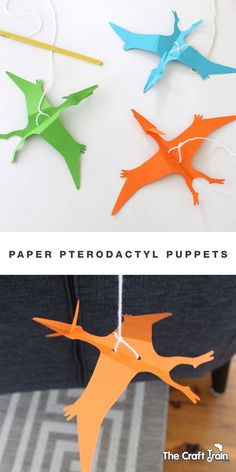 the paper birds are hanging from strings in different colors and shapes, with text overlay