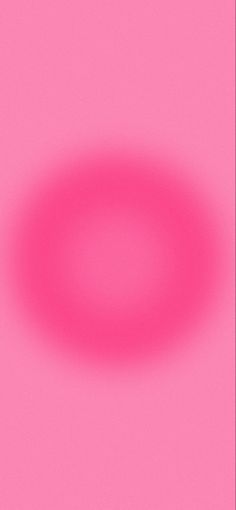 a pink circle is shown against a bright pink background