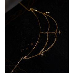 A necklace that looks like a constellation connecting stars. A design with a golden chain hanging down. Glossy stars emit a dazzling light. It has an elegant atmosphere as it sways every time you walk. A retro item with an exotic scent. 
 
 
 Item 
 
 Necklace 
 
 
 Size 
 
 Necklace decoration part 
 
 Height: 5.3cm 
 Width: 9.4cm 
 
 
 
 Material 
 
 Alloy 
 
 
 Others 
 
 If you have a metal allergy or the plating does not suit your skin, please refrain from ordering. Elegant Star-shaped Evening Jewelry, Gold Jewelry With Moon Charm For Party, Gold Satellite Chain Necklace For Party, Elegant Satellite Chain Necklace For Party, Celestial Party Jewelry With Adjustable Chain, Elegant Brass Necklace With Satellite Chain, Gold Crescent Jewelry For Party, Party Jewelry With Moon Charm, Celestial Star-shaped Party Jewelry