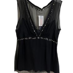 Fabulous Ellie Tahari Black Silk Chiffon With Attached Silk Under Slip. Embroidered With Silver Thread And Beads. Side Zip Size Large. New With Tags. I Paid $278 New And Will Not Negotiate Much Lower. Elegant Sleeveless Sheer Blouse, Chiffon V-neck Tops For Evening, Elegant Chiffon Top With Lace Trim, Sheer Sleeveless Evening Blouse, Elegant Chiffon Blouse With Lace Trim, Embellished Silk V-neck Top, Black Silk Tops With Lace Trim, Ellie Tahari, Elie Tahari