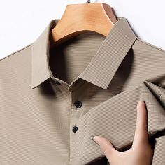 Season:Spring  Summer; Fabric:Polyester; Sleeve Length:Short Sleeve; Look After Me:Washable,Wet and Dry Cleaning; Gender:Men's; Style:Basic,Modern,Comfortable; Elasticity:Micro-elastic; Tops Type:Golf Shirt,Waffle Polo Shirt,Golf Polo; Occasion:Holiday,Work,Sports,Casual; Fit Type:Regular Fit; Pattern:Plain; Design:Button; Neckline:Lapel; Listing Date:06/14/2024; Bust:; Length:; Shoulder Width:; Sleeve: Workwear Polo Collar Top With Buttons, Solid Polo Shirt With Buttons, Solid Color Polo Collar Top With Buttons, Waffle Polo Shirt, Tuxedo Shirt Men, Womens Basic Tops, Mens Outdoor Jackets, Polo Classic, Trench Coat Men