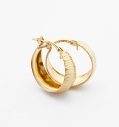 Classy stunning gold hoop earrings. We particularly love this pair for its lightweight design and surface shimmer. They are the perfect go-to for your everyday.Hoop size: 12mm Everyday Round Gold-plated Hoop Earrings, Everyday Round Gold Plated Hoop Earrings, Gold Small Hoop Huggie Earrings With Shiny Finish, Gold Shiny Finish Hoop Earrings For Everyday, Gold Hoop Earrings With Shiny Finish For Everyday, Gold Plated Huggie Earrings With Shiny Finish, Small Hoop Earrings In 14k Gold With Shiny Finish, Small Hoop 14k Gold Earrings With Shiny Finish, Small Hoop Gold-plated Jewelry With Shiny Finish