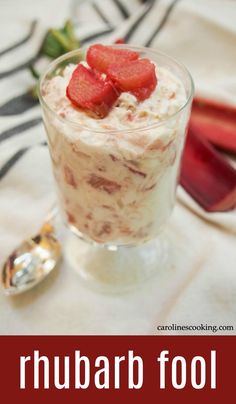 a close up of a dessert in a glass with strawberries on top and text reading rhubarb fool