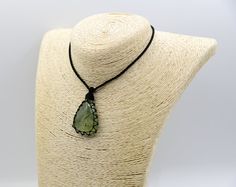 Beautiful handmade Macrame green Prehnite crystal pendant with an adjustable black necklace cord. Prehnite is a protective and spiritual growth crystal, it alignment the heart with the will and enhances prophecy insights. This beautiful necklace can be the perfect meaningful gift for a loved one or yourself! ►►This is a one-of-a-kind necklace, you will receive EXACTLY the one seen in the photos! *'¨) ¸.*'¸.**'¨) ¸. (¸.*' (¸.*` ♥ *FREE INTERNATIONAL SHIPPING ►►Pendant size: Stone length- 1.61'' / Adjustable Green Crystal Necklace, Handmade Adjustable Teardrop Pendant Crystal Necklace, Handmade Adjustable Teardrop Crystal Necklace, Adjustable Green Crystal Necklaces For Meditation, Adjustable Agate Crystal Pendant Necklace, Adjustable Green Gemstone Crystal Necklaces, Adjustable Green Gemstone Crystal Necklace, Adjustable Green Crystal Necklaces With Natural Stones, Adjustable Green Crystal Gemstone Necklace