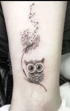 an owl with dandelions tattoo on the ankle