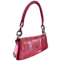 Beautiful early 2000s ESCADA pink patchwork python snakeskin evening bag! Various shades of pink python matches anything! Front and back panels feature a slightly darker shades of pink, while the sides and bottom feature a lighter bubblegum pink python. Large silver links at each side are embossed with the signature Escada logo, with silver Escada logo at each side bottom. Strap is natural leather in a bubblegum pink. Easily fits on the shoulder or the forearm. Snap closure, and interior side zi 2000s Halloween, 2000s Purse, Jinafire Long, 2000s Bags, Pink Python, Snake Purse, Clutch Bag Pattern, Pretty Items, Snake Bag